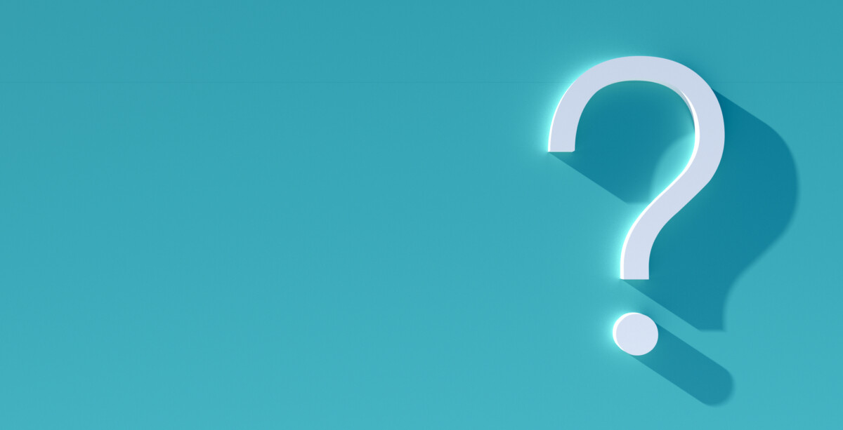 question mark in front of a red color wall background. Business support concept